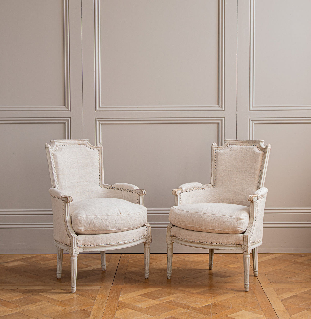 Antique White Bergere Armchairs Late 19th century French Armchairs - La Maison London