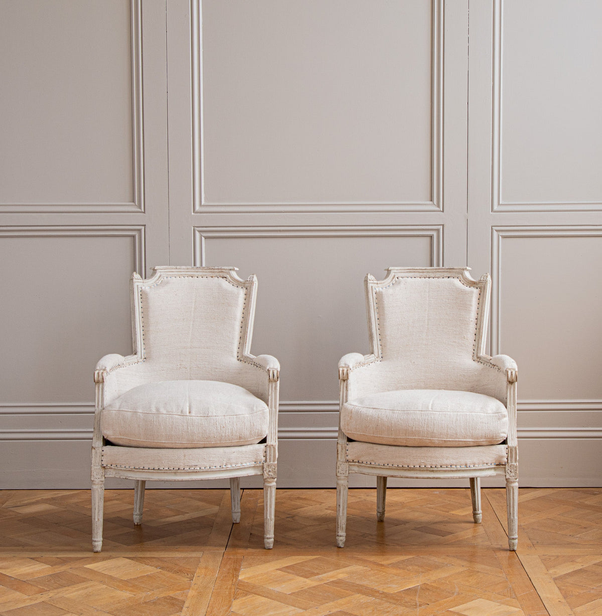 Antique White Bergere Armchairs Late 19th century French Armchairs - La Maison London