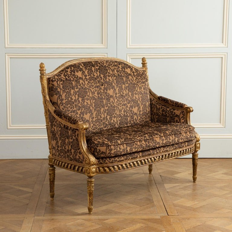 A Finely Carved Louis XVI Style Giltwood Sofa - La Maison London