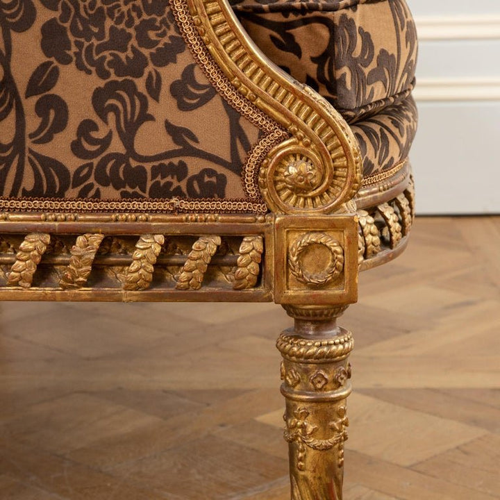 A Finely Carved Louis XVI Style Giltwood Sofa - La Maison London