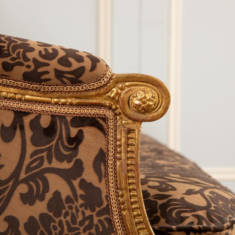 A Finely Carved Louis XVI Style Giltwood Sofa - La Maison London