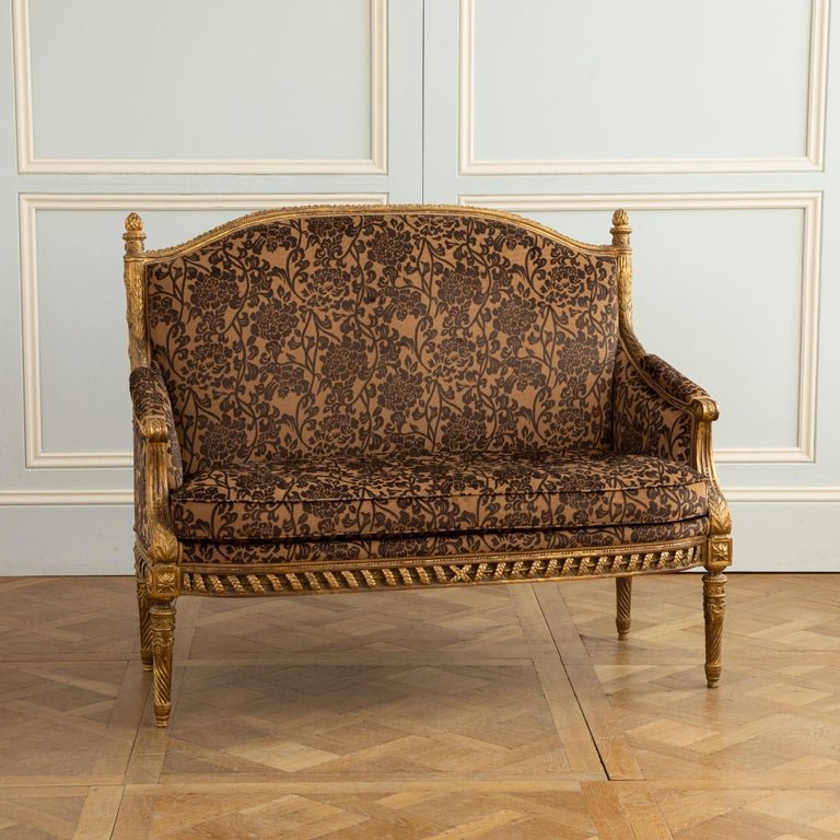 A Finely Carved Louis XVI Style Giltwood Sofa - La Maison London