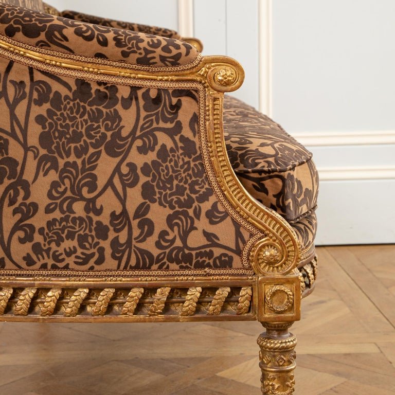 A Finely Carved Louis XVI Style Giltwood Sofa - La Maison London