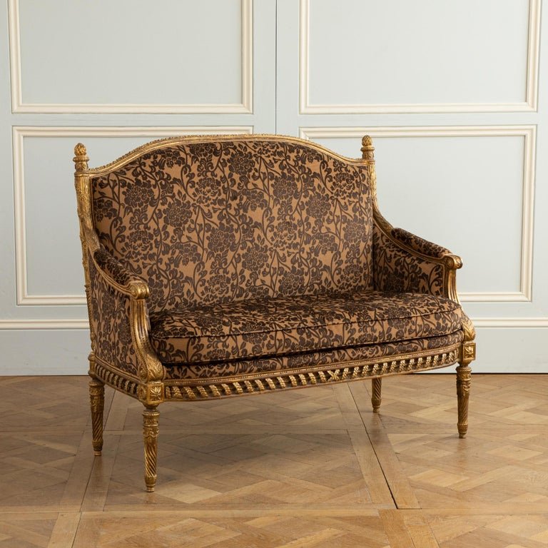 A Finely Carved Louis XVI Style Giltwood Sofa - La Maison London