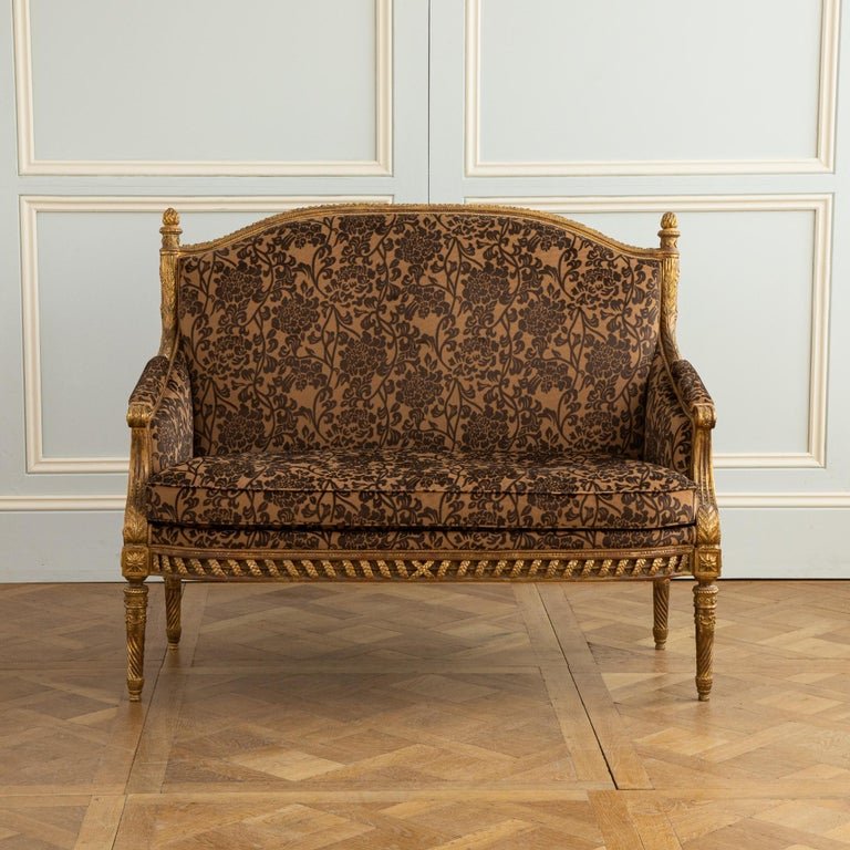 A Finely Carved Louis XVI Style Giltwood Sofa - La Maison London