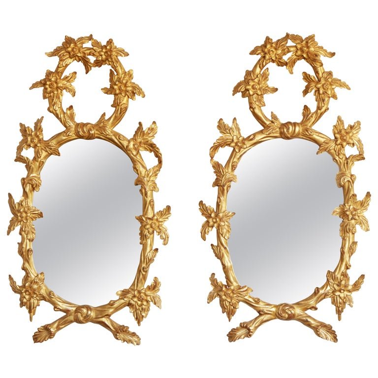 Pair of Hand Carved Oval Gilt Wood Mirrors - La Maison London